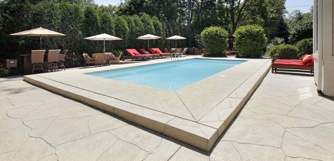 Concrete deck formed after our pool contractors installed this pool in Vancouver.